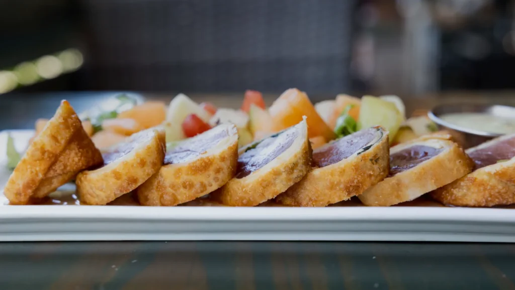 Rare tuna wrapped with basil